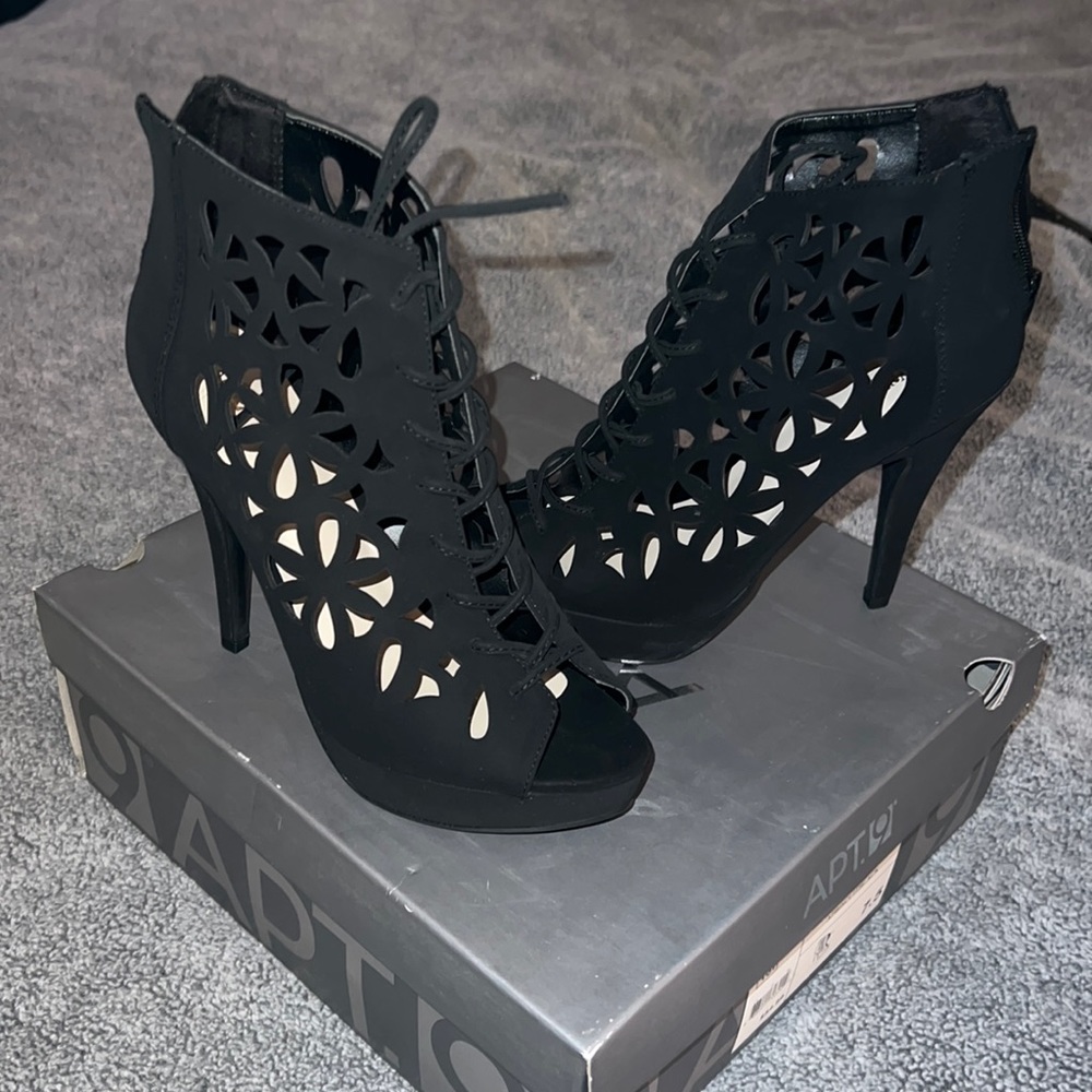New, never worn black heel bootie. Size women’s 7.5
